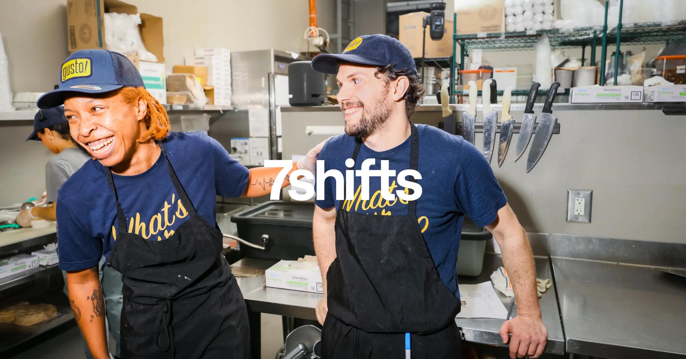 Back of house restaurant team laughing in kitchen