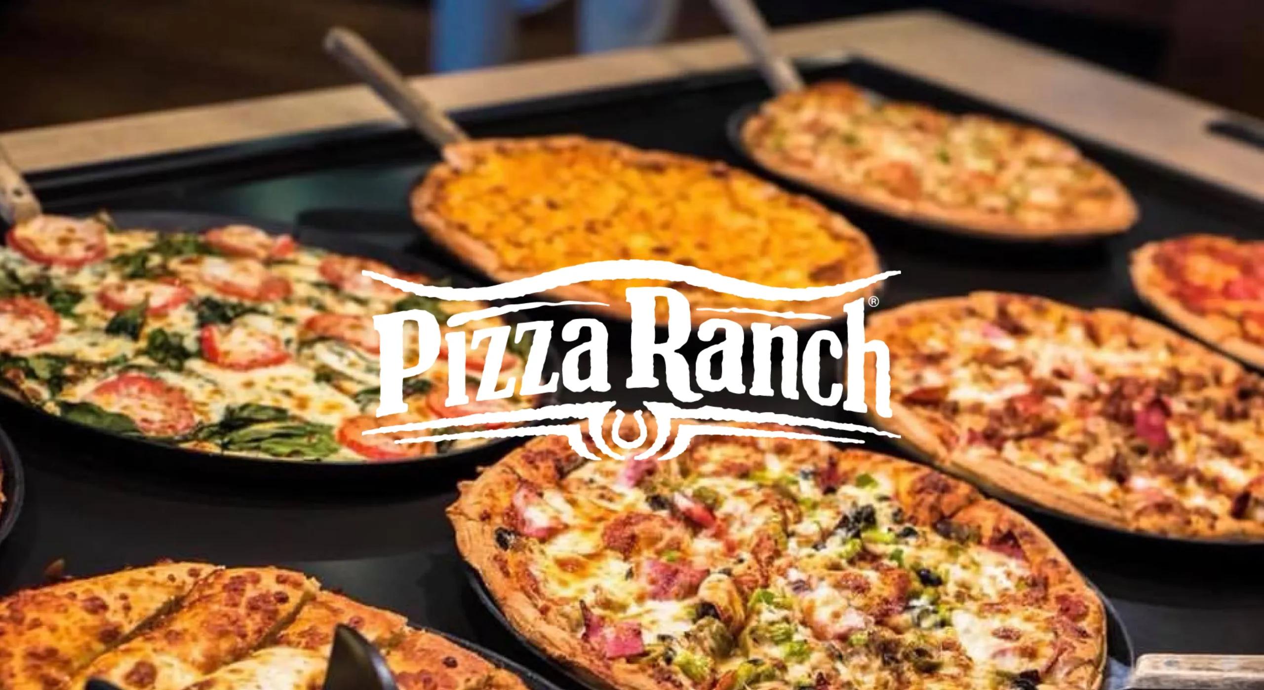 Buffet of pizzas at Pizza Ranch Restaurant with logo on top