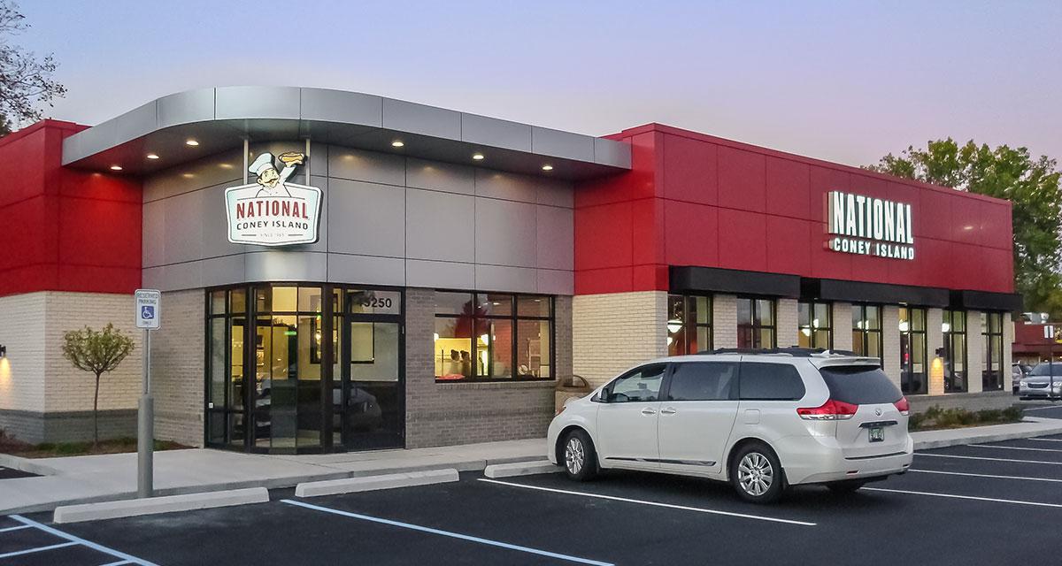 Photo of National Coney Island restaurant with a car parked outside