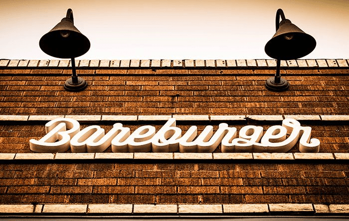 Bareburger sign on brick building facade