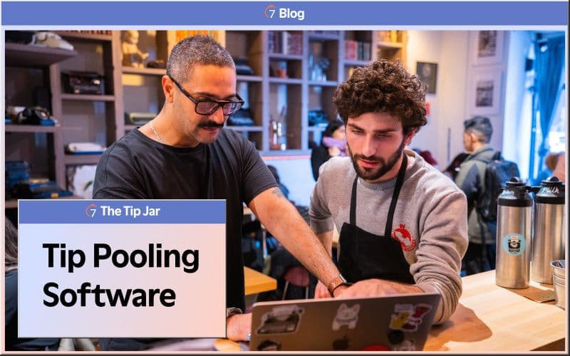 Cafe staff using tip pooling software on laptop